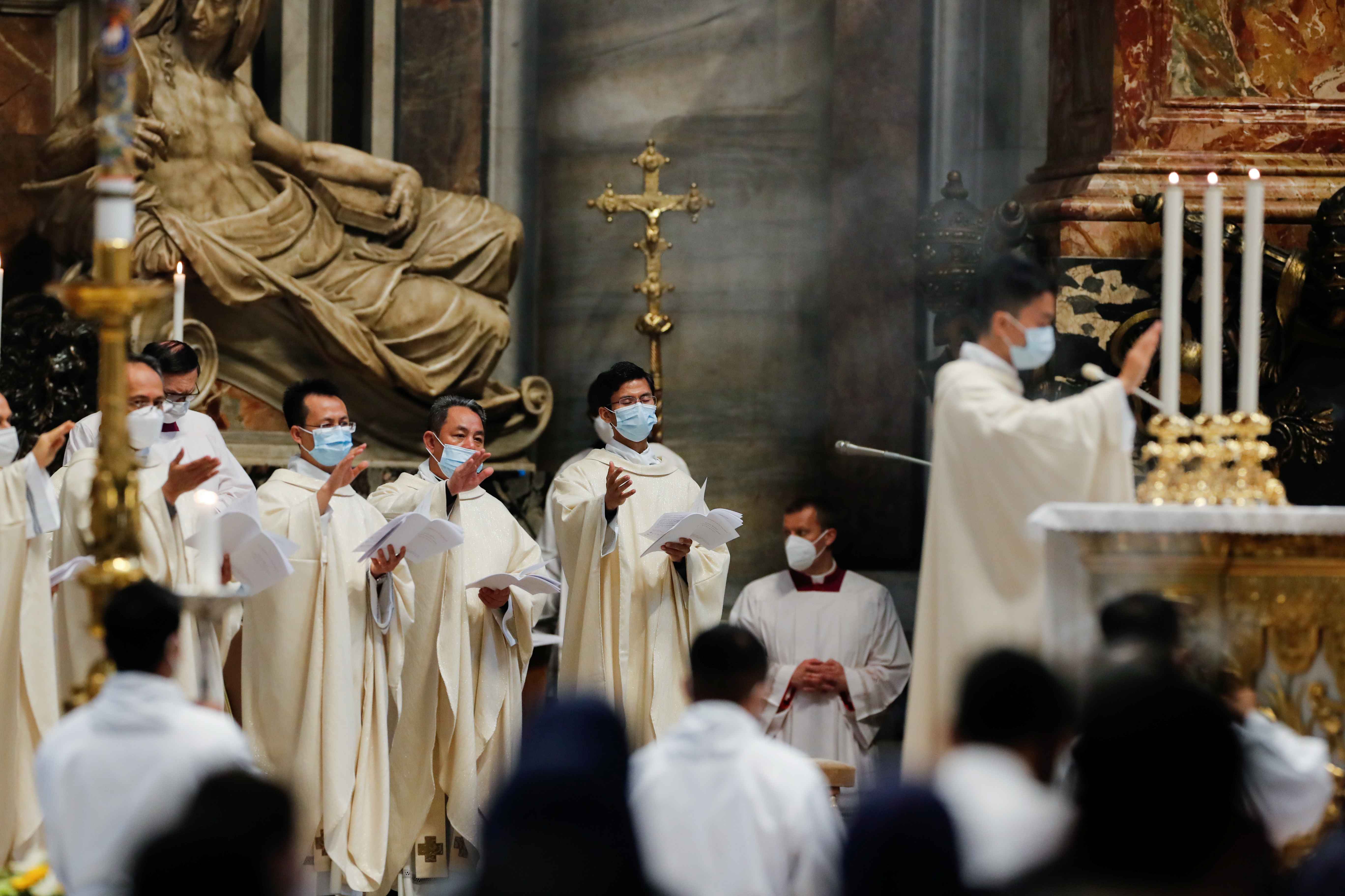 Members of the clergy attend Holy Mass held by Pope Francis for the community of the faithful of Myanmar resident in Rome, at the Vatican, May 16, 2021. REUTERS/Remo Casilli/Pool