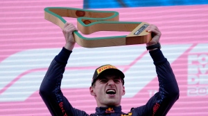 Red Bull driver Max Verstappen of the Netherlands raises the trophy after winning the Styrian Formula One Grand Prix at the Red Bull Ring racetrack in Spielberg, Austria, Sunday, June 27, 2021. (AP Photo/Darko Vojinovic) 