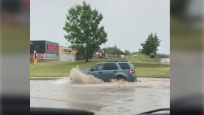 Heavy downpours lead to dangerous driving conditions in the downtown core of Midland near Hugel Avenue on June 26, 21 (Courtesy: Susan)