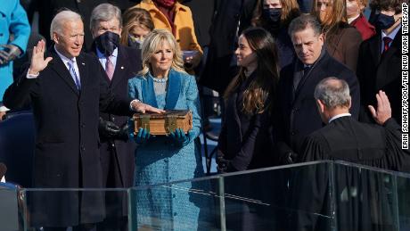 Joe Biden is sworn in as the 46th president of the United States by Chief Justice John Roberts as Jill Biden holds the Bible during the 59th Presidential Inauguration at the U.S. Capitol in Washington, Wednesday, Jan. 20, 2021.(Erin Schaff/The New York Times via AP, Pool)