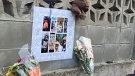 Flowers and a poster left for Jared Zook, who died in the crane collapse in Kelowna on July 12, 2021.
