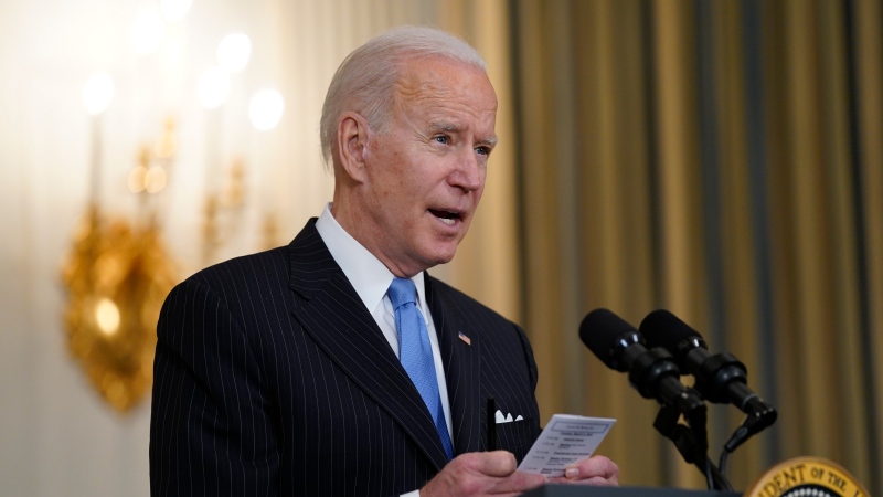 U.S. President Joe Biden speaks about efforts to combat COVID-19, in the State Dining Room of the White House, Tuesday, March 2, 2021, in Washington. (AP Photo/Evan Vucci)