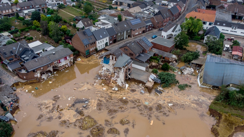 Destroyed houses are seen in Erftstadt-Blessem, Germany, Saturday, July 17, 2021. Due to strong rain falls the small Erft river went over the banks causing massive damages. (AP Photo/Michael Probst) 