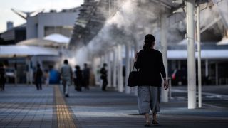 The authorities in Tokyo have installed misting stations and shelters that produce a fine spray of cooling water onto passing pedestrians (Credit: Matthias Hangst/Getty Images)