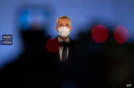 FILE - NATO Secretary General Jens Stoltenberg speaks during a media conference at NATO headquarters in Brussels.