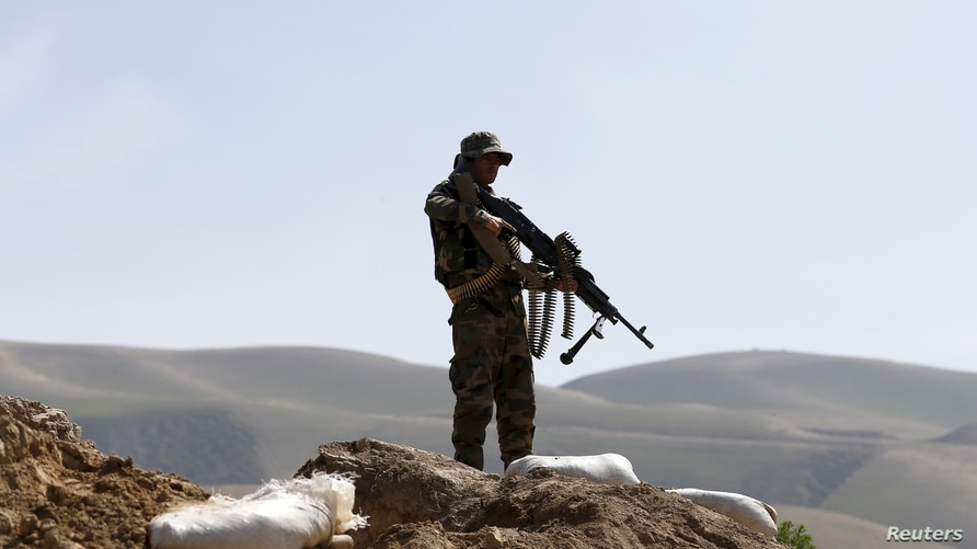 An Afghan National Army (ANA) soldier keeps watch during a patrol in Dand Ghori district of Baghlan province, Afghanistan March…