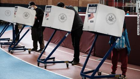 People visit an early voting site at a YMCA in Brooklyn on October 25, 2021 in New York City. Over 30,000 New Yorkers have already cast their ballots in a series of races in New York City including for the election of the next mayor of the city. Election day is on November 2.