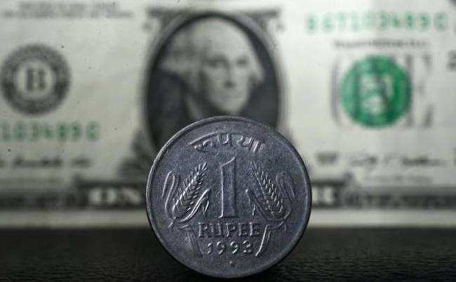 Rupee gains 19 paise to end at 74.68 against US dollar