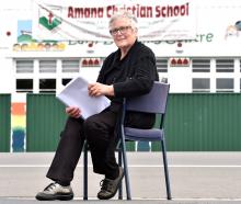 Sitting across the road from her school yesterday is Amana Christian School principal Roslyn King...