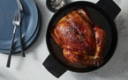 A buttermilk-brined roast turkey, a recipe inspired by the Southern method of marinating chicken overnight in buttermilk before frying, and adapted fr