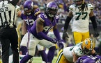 Sheldon Richardson of the Vikings reacted after tackling Packers quarterback Aaron Rodgers on Sunday.