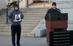 Former Secretary of State Mark Ritchie, right, remembered his daughter Rachel, who was killed by a drunk driver in 2000. A photo of Rachel is held up 