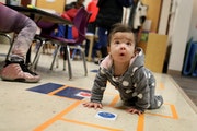 A toddler explored north Minneapolis’ Mona Moede Early Learning Center in 2018. Families with preschoolers have important allies in Minnesota busine