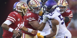 San Francisco center Alex Mack had a handful of Anthony Barr’s Vikings jersey on Sunday as quarterback Jimmy Garoppolo looked to pass.