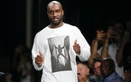 FILE -Fashion designer Virgil Abloh gives a thumbs up after the presentation of Off-White Men’s Spring-Summer 2019 collection presented in Paris, We