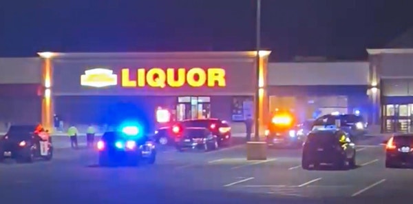 The scene outside a liquor store in Mounds View