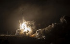 The SpaceX Falcon 9 rocket launches with the Double Asteroid Redirection Test, or DART, spacecraft onboard, Tuesday, Nov. 23, 2021, from Space Launch 