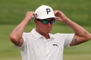 Rickie Fowler adjusted his sunglasses Friday at the 3M Open at the TPC Twin Cities.