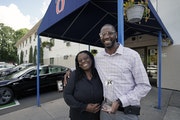 Michael Porter, with wife Tenesha Crenshaw-Porter, outside the Motel 6 on St. Paul’s East Side, has transcended a life of alcohol and drugs, includi