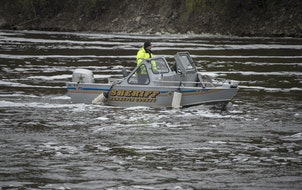 A deputy from the Hennepin County Sheriff’s office searched for a missing person in the Mississippi River in 2017.