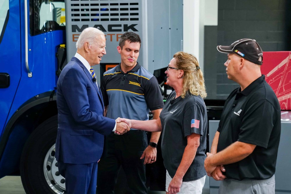 President Joe Biden greets workers during his tour of the Mack-Lehigh Valley Operations Manufacturing Facility in Macungie, Pennsylvania on Wednesday, July 28, 2021.