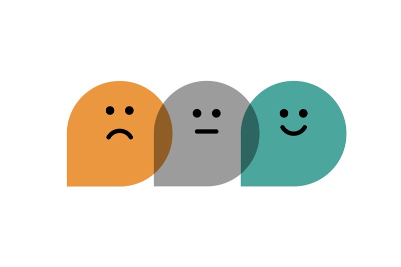 Illustration of three overlapping bubbles with a sad, neutral and smiling face