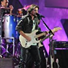 Juanes in A Decade of Difference: A Concert Celebrating 10 Years of the William J. Clinton Foundation (2011)