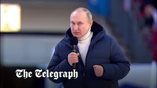 video: In a £10,500 Italian designer coat, a limping Vladimir Putin tries to rally his people