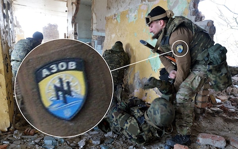 The emblem can be seen here on Azov uniform on a training exercise in 2015