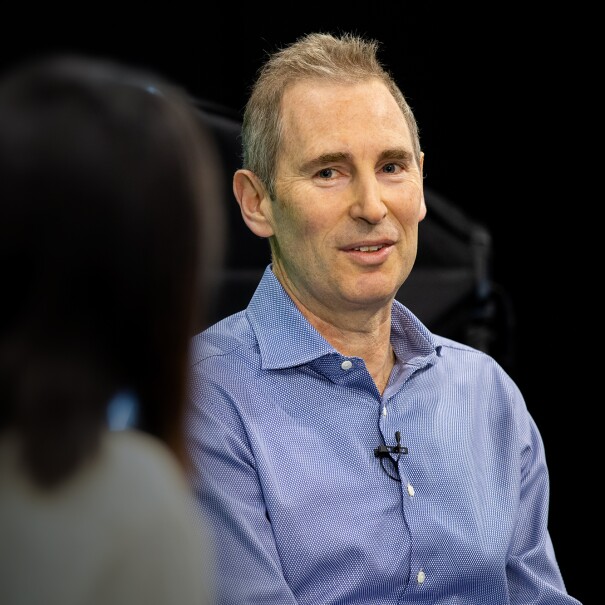 Andy Jassy, CEO of Amazon, speaks with Alicia Boler Davis as he answers employee questions at a fireside chat. 