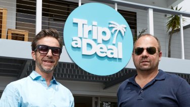 TripADeal co-founders Richard Johnston (left) and Norm Black at Byron Bay.  
