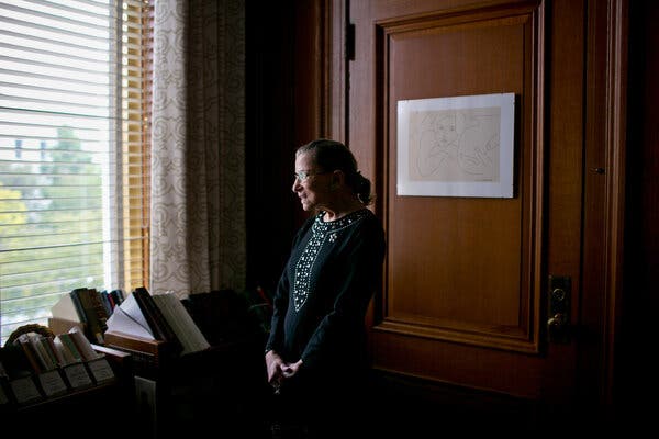 Justice Ruth Bader Ginsburg in 2013 in her chambers. She once said that her years as the solitary female justice were “the worst times.”
