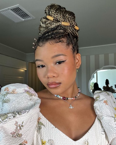 Storm Reid in box braid ombre bun with beads