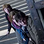 Rupert Grint, Daniel Radcliffe, and Emma Watson in Harry Potter and the Deathly Hallows: Part 2 (2011)