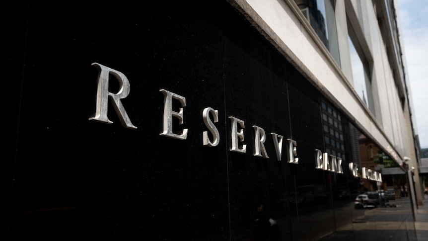 A sign saying "Reserve Bank of Australia" on the exterior wall of the RBA's Sydney headquarters