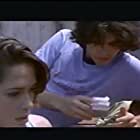 Adrian Grenier and Aesha Waks in Arresting Gena (1997)