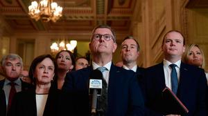 DUP leader Jeffrey Donaldson speaks to the media alongside party members at Stormont. Photo Charles McQuillan