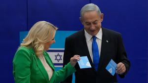 Benjamin Netanyahu and his wife Sara cast their ballots during Israeli elections in Jerusalem. Photo: Maya Alerruzzo