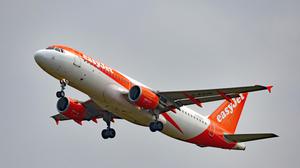 A easyJet Airbus A320-214 (G-EZUO) passenger airliner comes in to land at Stansted Airport in Essex.