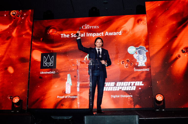 Marek Olszewski accepted the Social Impact Award at the Crypties on behalf of Celo, a platform that makes cryptocurrency available on mobile phones.
