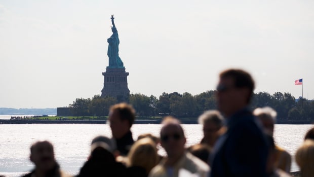 people-on-boat-near-statue-of-liberty