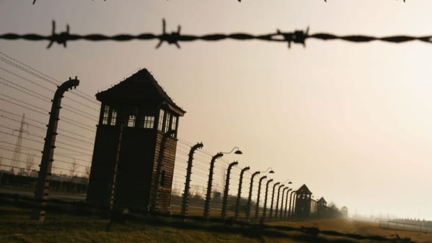Watch towers surrounded by high voltage fences at Auschwitz II-Birkenau which was built in March 1942. The camp was liberated by the Soviet army on January 27, 1945.