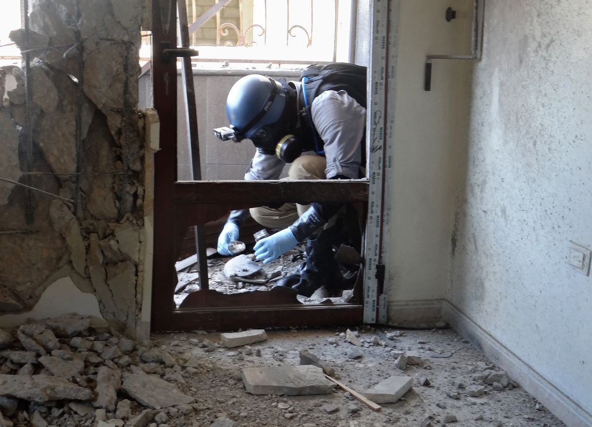 A UN chemical weapons inspector in Ghouta, Syria (Ammar al-Arbini/AFP/Getty)