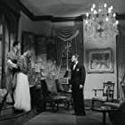 Don Ameche, Claudette Colbert, and Robert Cummings in Sleep, My Love (1948)