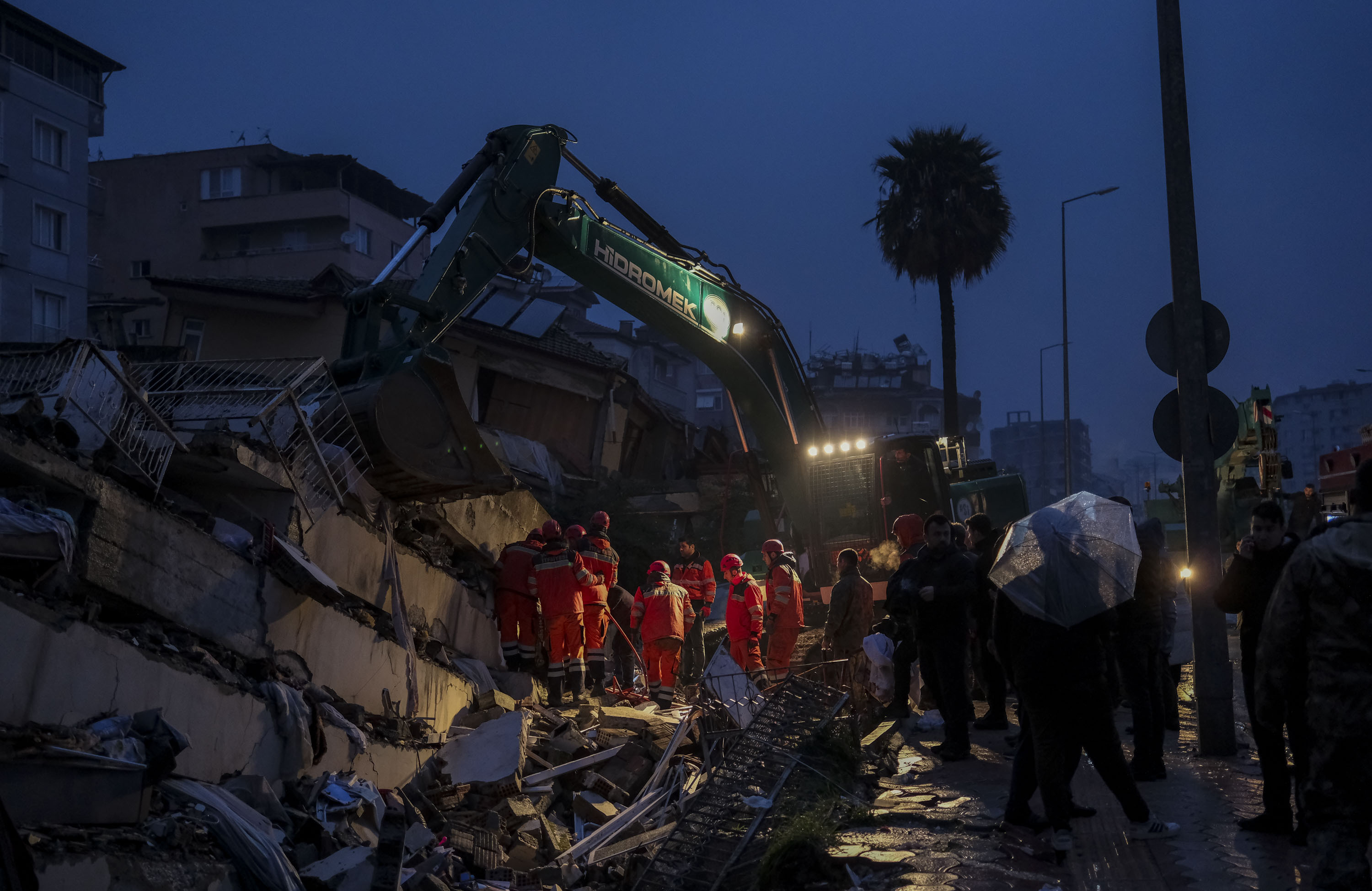 People mourn as rescue efforts continue at collapsed building after 7.7 magnitude earthquake hits Hatay, Turkiye on February 06, 2023.