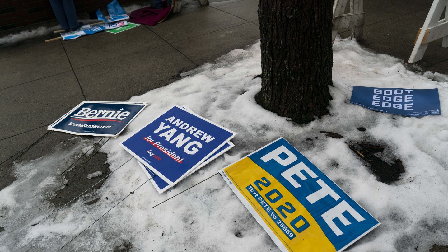 Campaign signs in snow near a voting location in Nashua, N.H., on Feb. 11, 2020.