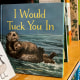 The children's book "I Would Tuck You In," illustrated by Mitchell Thomas Watley, at a bookstore in Portland, Ore., on April 5, 2023.