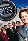 Michael J. Fox, Barry Bostwick, Alan Ruck, Michael Boatman, Connie Britton, Alexander Chaplin, and Richard Kind in Spin City (1996)