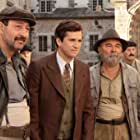 Guillaume Canet, Gérard Jugnot, and Kad Merad in War of the Buttons (2011)