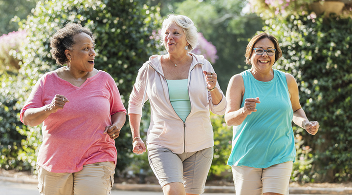 Three women exercising outdoors
